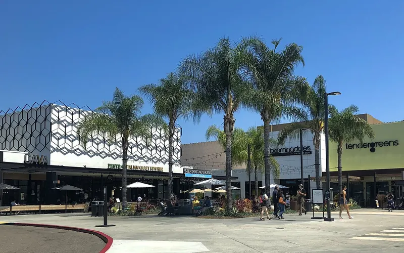 Palm-lined shops and restaurants at Westfield Mission Valley in San Diego